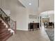 Inviting entryway with staircase and stylish decor at 3925 Kettle Falls Ave, North Las Vegas, NV 89085
