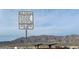 Sign with fly field hours with a mountain view in the background at 3925 Kettle Falls Ave, North Las Vegas, NV 89085