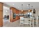 Beautiful kitchen with wood cabinets, stainless steel appliances, and a breakfast bar at 3925 Kettle Falls Ave, North Las Vegas, NV 89085