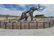 Outdoor sculpture of a mammoth with the museum in the background at 3925 Kettle Falls Ave, North Las Vegas, NV 89085