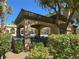 Outdoor kitchen area featuring a grill and covered seating, perfect for outdoor entertaining at 3925 Kettle Falls Ave, North Las Vegas, NV 89085