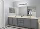 Bathroom featuring double sinks, good lighting, and modern fixtures at 3950 S Sandhill Rd # 132, Las Vegas, NV 89121