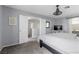 Spacious main bedroom with neutral colors, TV, and access to ensuite bathroom at 3950 S Sandhill Rd # 132, Las Vegas, NV 89121