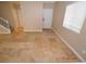 Open living room featuring tile floors, stairway, and natural light at 41 Rosa Rosales Ct, North Las Vegas, NV 89031