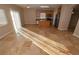 Open floor plan living room featuring tile flooring and kitchen view at 41 Rosa Rosales Ct, North Las Vegas, NV 89031