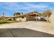 Spacious backyard with covered patio and ample parking, great for entertaining at 4795 W Maulding Ave, Las Vegas, NV 89139