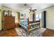 Cozy bedroom features a comfortable bed, patterned rug, and ample natural light at 4795 W Maulding Ave, Las Vegas, NV 89139