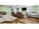 Spacious bonus room with large windows and beds, perfect for guests or recreation at 4795 W Maulding Ave, Las Vegas, NV 89139