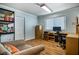 Office space features ample desk space and built-in shelving at 4795 W Maulding Ave, Las Vegas, NV 89139