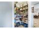 Walk-in pantry featuring organized shelving with lots of food and supplies at 4795 W Maulding Ave, Las Vegas, NV 89139
