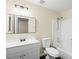 Clean bathroom with white vanity, framed mirror, and shower-tub combination at 5330 E Charleston Blvd # 116, Las Vegas, NV 89142