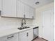 Kitchen featuring shaker style cabinets, white countertops, and stainless steel appliances at 5330 E Charleston Blvd # 116, Las Vegas, NV 89142