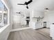 Open-concept kitchen and dining area with modern stainless steel appliances and plenty of natural light at 5330 E Charleston Blvd # 116, Las Vegas, NV 89142