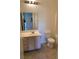 Bathroom featuring a single sink vanity and tile floor, ready for personal touches at 5650 E Sahara Ave # 2041, Las Vegas, NV 89142