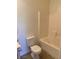 Bathroom with a toilet, shower and tub combination with neutral colors at 5650 E Sahara Ave # 2041, Las Vegas, NV 89142