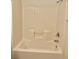 Bathroom featuring a clean, white tub and shower combo, ideal for relaxation at 5650 E Sahara Ave # 2041, Las Vegas, NV 89142