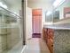 Nicely appointed bathroom showcasing granite counters and a walk-in shower at 6250 W Flamingo Rd # 11, Las Vegas, NV 89103