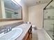 Well-lit bathroom featuring granite counters, sleek fixtures, and a glass-enclosed shower at 6250 W Flamingo Rd # 11, Las Vegas, NV 89103