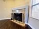 Charming fireplace with decorative surround and mantle in the living area at 6250 W Flamingo Rd # 11, Las Vegas, NV 89103
