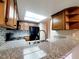 Granite countertops and stainless steel sink in the renovated kitchen at 6250 W Flamingo Rd # 11, Las Vegas, NV 89103