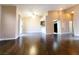 Open floor plan living room with hardwood floors and access to the kitchen at 6250 W Flamingo Rd # 11, Las Vegas, NV 89103