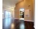 Open-concept living room features hardwood floors, access to the kitchen, and natural light at 6250 W Flamingo Rd # 11, Las Vegas, NV 89103