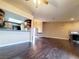 Open living space with updated kitchen, fireplace, and hardwood floors at 6250 W Flamingo Rd # 11, Las Vegas, NV 89103
