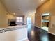 Bright living room with fireplace, hardwood floors, and sliding glass doors to the outside at 6250 W Flamingo Rd # 11, Las Vegas, NV 89103