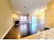 Spacious living room featuring a fireplace and sliding glass door for ample natural light at 6250 W Flamingo Rd # 11, Las Vegas, NV 89103