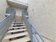 A staircase with a metal railing leads to the upper-level residences, providing access to the units above at 6250 W Flamingo Rd # 11, Las Vegas, NV 89103