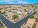 Aerial view of a residential neighborhood with well-maintained homes and landscaping at 6429 Pronghorn Ridge Ave, Las Vegas, NV 89122
