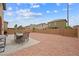 Backyard featuring dining and BBQ area with decorative rock and privacy walls at 6429 Pronghorn Ridge Ave, Las Vegas, NV 89122