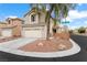 Inviting two-story home with a well-maintained front yard and a convenient two-car garage at 6429 Pronghorn Ridge Ave, Las Vegas, NV 89122