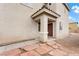 Two-story home featuring a covered front porch and a stone-lined walkway up to the front door at 6429 Pronghorn Ridge Ave, Las Vegas, NV 89122