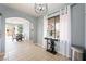 Bright, open kitchen featuring white cabinetry and dining area with large window at 6429 Pronghorn Ridge Ave, Las Vegas, NV 89122