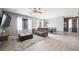 Open floor plan showcasing the living room and dining area with modern decor at 6429 Pronghorn Ridge Ave, Las Vegas, NV 89122