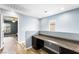 Upstairs hallway with built in desk and cabinet storage at 6429 Pronghorn Ridge Ave, Las Vegas, NV 89122