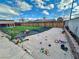 The backyard features a play area and a detached shade structure at 6489 Gunderson Blvd, Las Vegas, NV 89103