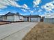 Single story home featuring a long driveway and lawn at 6489 Gunderson Blvd, Las Vegas, NV 89103