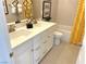 Stylish bathroom with double vanity, modern fixtures, and decorative herringbone patterned tiles at 6507 Dove Point Pl, Las Vegas, NV 89130