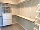 Spacious walk-in closet with shelving and drawers, offering ample storage space at 6507 Dove Point Pl, Las Vegas, NV 89130