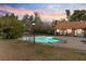 Backyard pool with diving board and plenty of patio space for outdoor relaxation at 6998 Alamitos Cir, Las Vegas, NV 89120