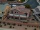 This house has a large back deck, manicured landscaping and a desert stone yard at 827 Happy Sparrow Ave, Henderson, NV 89052