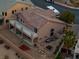 This house has a large back deck, manicured landscaping and a desert stone yard at 827 Happy Sparrow Ave, Henderson, NV 89052