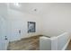 Bright entryway featuring wood-look tile floors, white walls, and a window for natural light at 827 Happy Sparrow Ave, Henderson, NV 89052