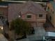 Charming two-story home with a three car garage and well-manicured landscaping at 827 Happy Sparrow Ave, Henderson, NV 89052