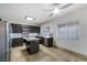 Bright kitchen featuring an island, stainless steel appliances, and ample cabinet space at 827 Happy Sparrow Ave, Henderson, NV 89052