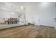 Bright living room features tile floors, vaulted ceilings and view of second floor at 827 Happy Sparrow Ave, Henderson, NV 89052