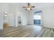 Bedroom with balcony access and ensuite bath featuring walk-in shower with marble-look tile at 827 Happy Sparrow Ave, Henderson, NV 89052