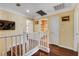 Hallway with hardwood floors accessing the bathroom and bedrooms of the home at 8988 Dusseldorf Way, Las Vegas, NV 89147